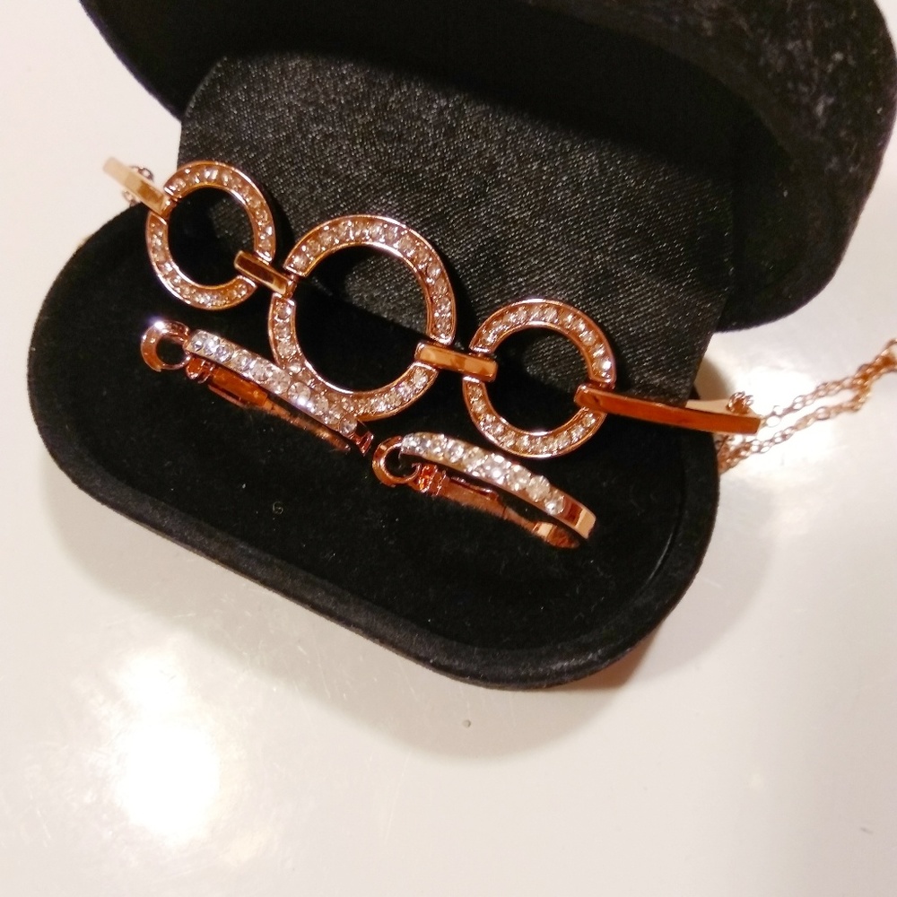 Rose gold bracelet and earrings